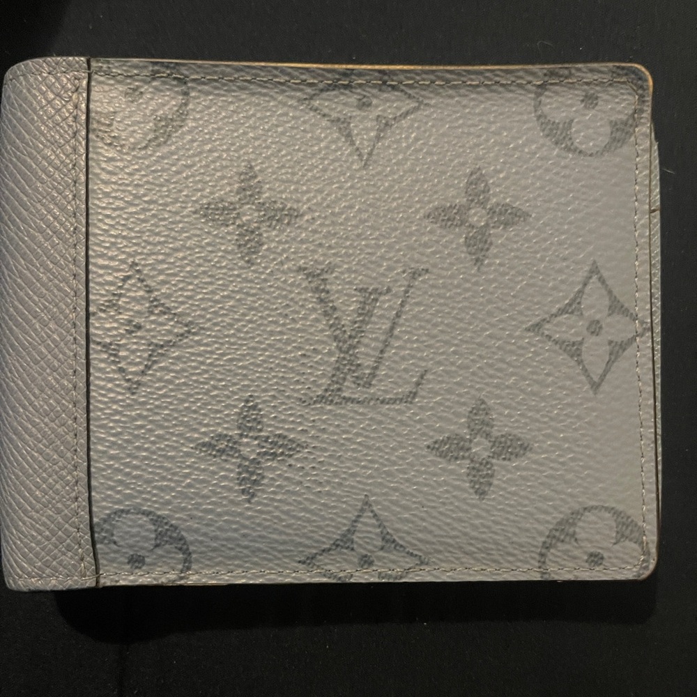 Pastel blue Louis Vuitton men’s or women’s wallet.